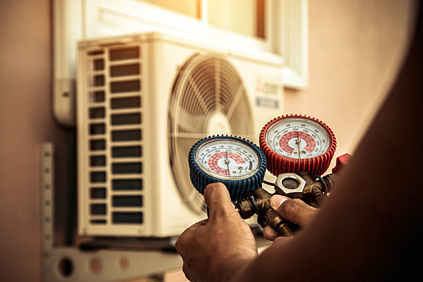 Professional Ac Installation technician working in Guys, TN